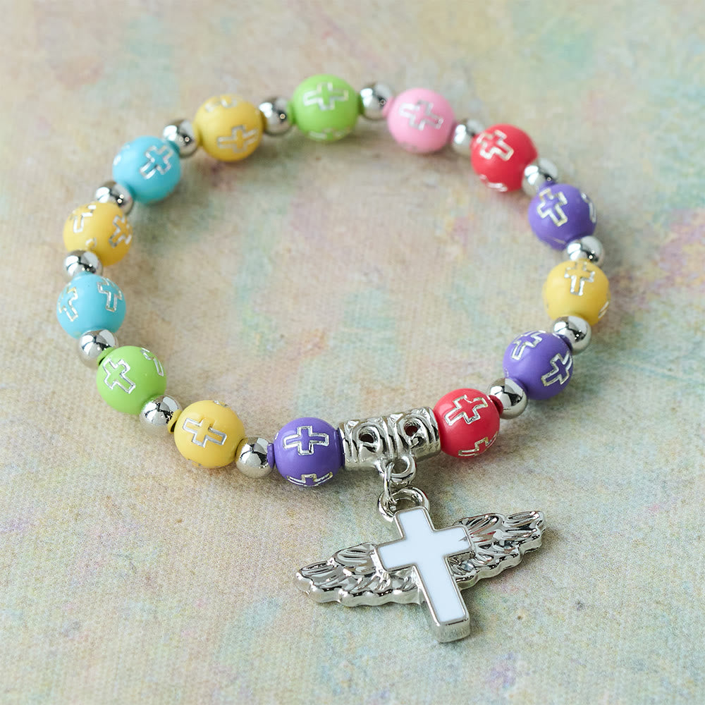 Pulsera con Dije de Cruz Alada: Oración Visual de Devoción y Conexión