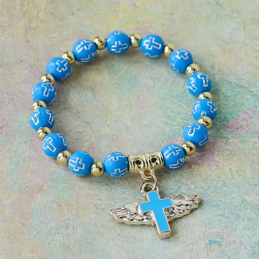 Pulsera con Dije de Cruz Alada: Oración Visual de Devoción y Conexión
