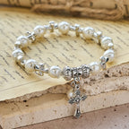 Pulsera de Cuentas con Detalle de Cruz de Plata: Encarna la Gracia de la Reflexión en Oración