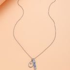 Collar de Fe Semilla de Mostaza con Corazón y Gota: Símbolo de una Fe Pequeña pero Poderosa