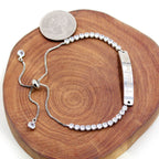 Pulsera de Fe y Valor de Metal en Cuatro Colores con Barra Grabada o Lisa