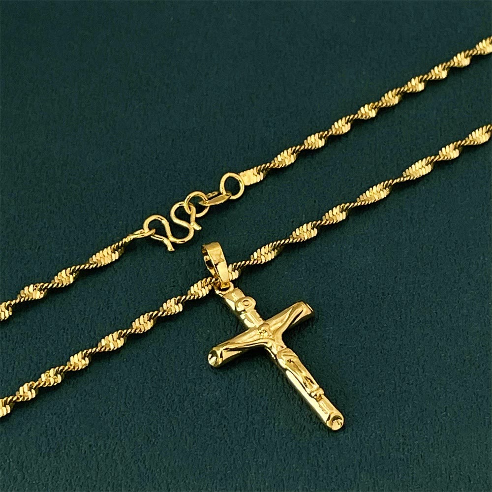 Collar Crucifijo Tono Dorado: Símbolo del Sacrificio Redentor de Cristo