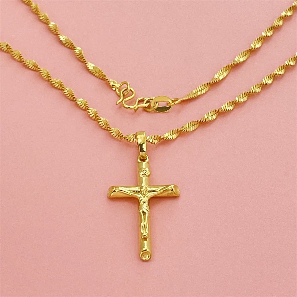 Collar Crucifijo Tono Dorado: Símbolo del Sacrificio Redentor de Cristo