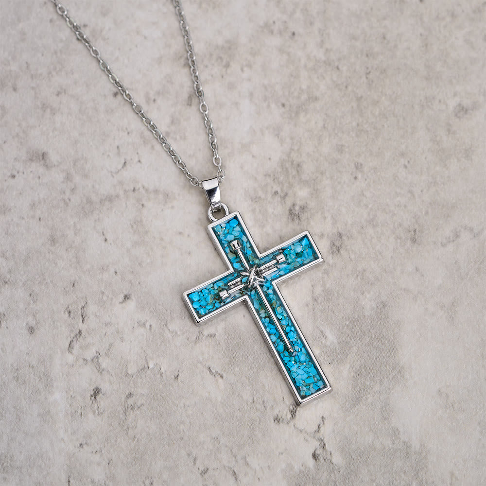 Collar de Cruz de Clavo con Incrustación de Turquesa: Símbolo del Amor Sacrificial de Cristo
