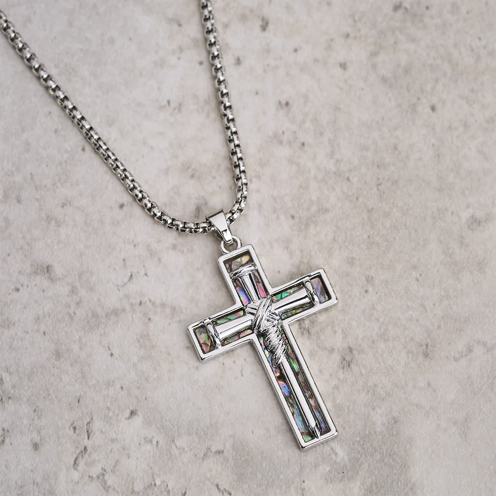 Collar de Cruz de Clavo con Incrustación de Concha Abulón: Símbolo del Amor Sacrificial de Cristo