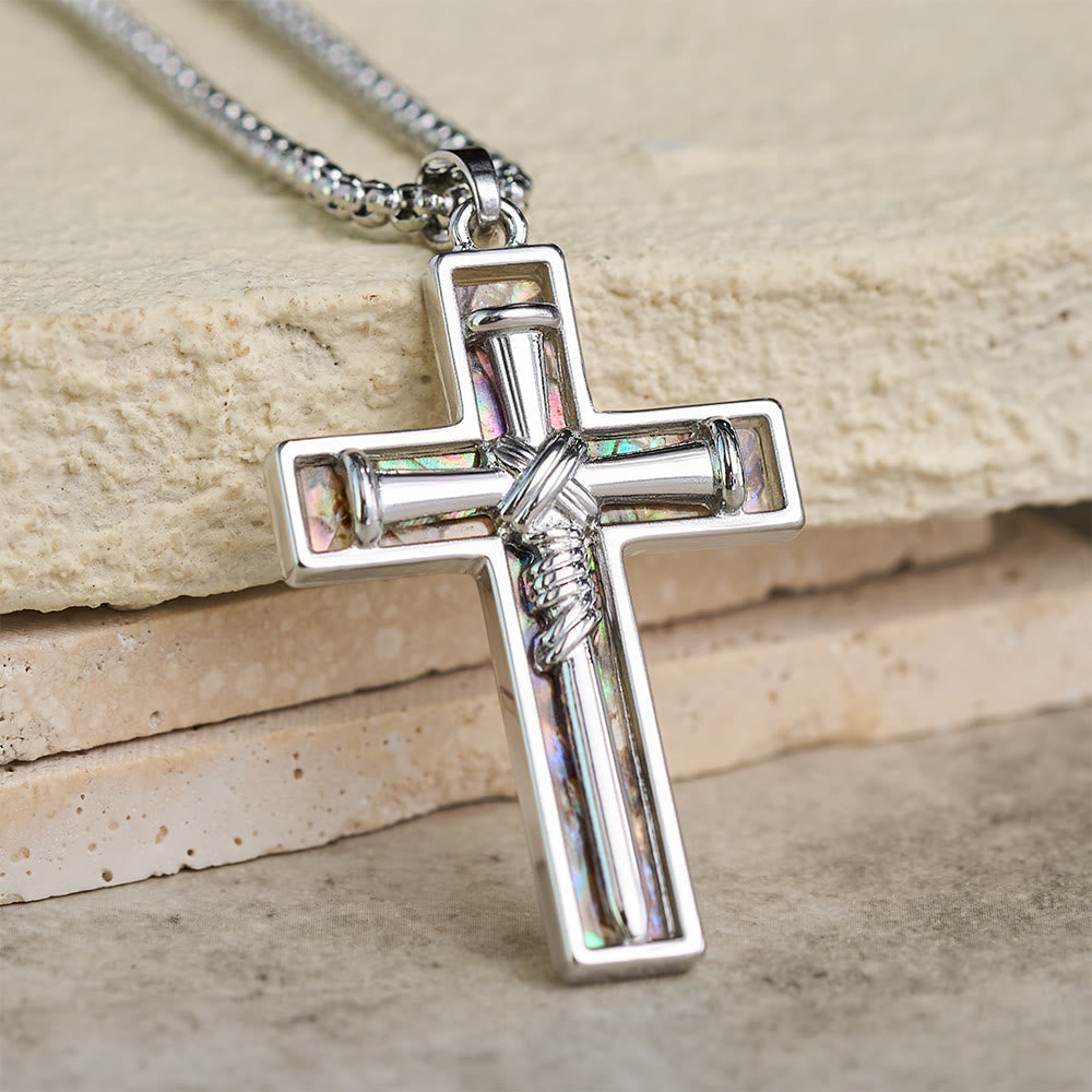 Collar de Cruz de Clavo con Incrustación de Concha Abulón: Símbolo del Amor Sacrificial de Cristo