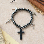 Pulsera de Cuentas de Hematita con Cruz y Mini Crucifijos: Protección Divina y Fe