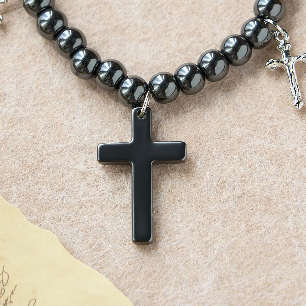 Pulsera de Cuentas de Hematita con Cruz y Mini Crucifijos: Protección Divina y Fe