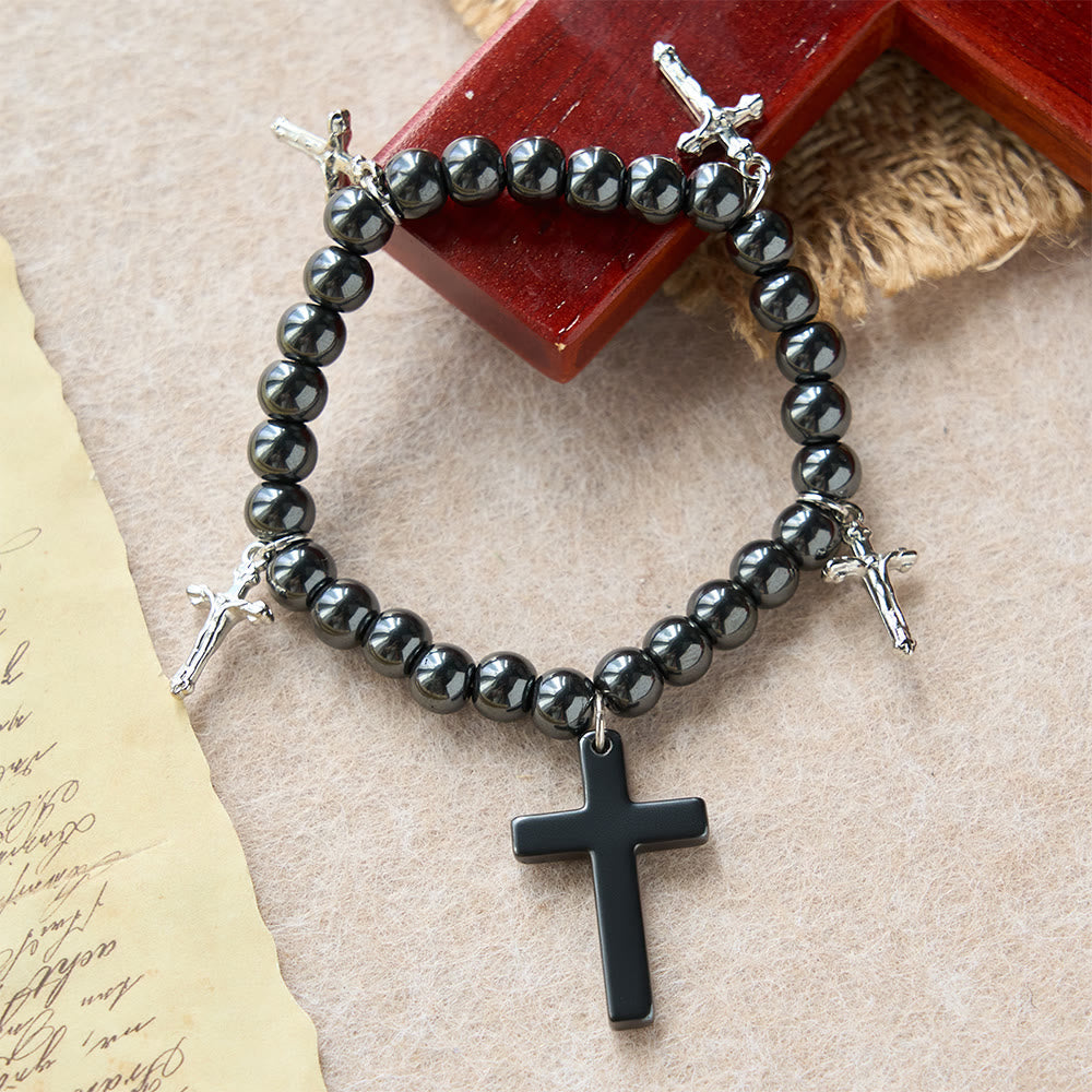 Pulsera de Cuentas de Hematita con Cruz y Mini Crucifijos: Protección Divina y Fe