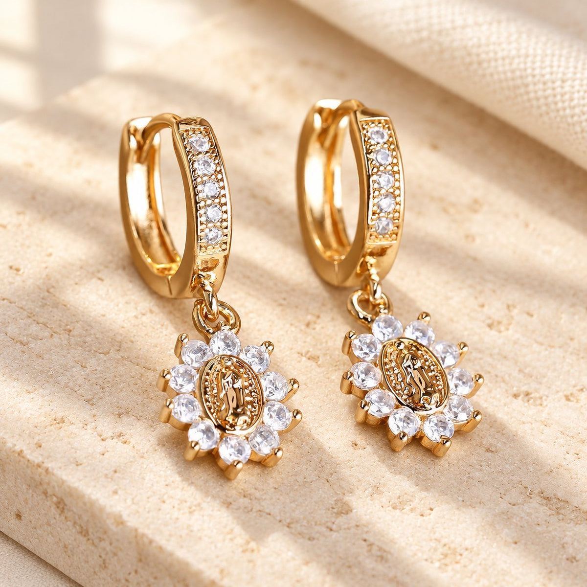 Our Lady Zircon Halo Huggie Earrings with Sunburst Medallion