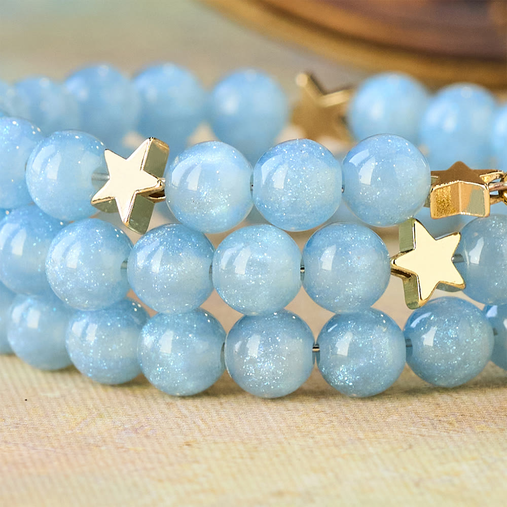 Pulsera Envolvente de Cuentas de Cristal Azul con Separadores de Estrella y Crucifijo Dorado