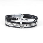 Pulsera de Cuero Multicapa "BENDECIDO" con Cruz y Circonia: Gracia Divina y Gozo Espiritual