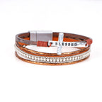 Pulsera de Cuero Multicapa "BENDECIDO" con Cruz y Circonia: Gracia Divina y Gozo Espiritual