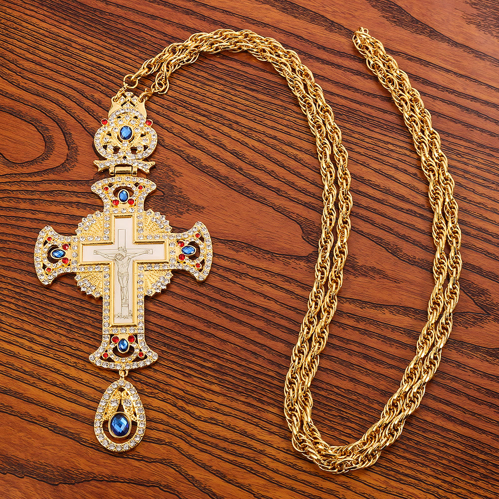 Collar con Dije de Cruz Ortodoxa Ornamentada con Gemas: Emblema de Redención y Gloria Divina