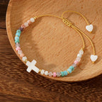 Pulsera de Amistad de Cuentas de Piedra Natural con Cruz Calada: Ícono de Devoción Espiritual