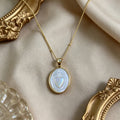 Collar de Santos con Perla Blanca Natural: Sagrado Corazón, Jesús, la Virgen y San Miguel