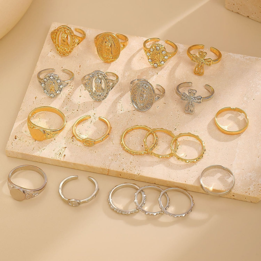 Set de Anillos de Cruz Mariana en Oro y Plata: Señal de Devoción Celestial