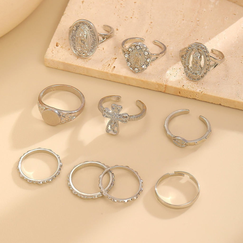 Set de Anillos de Cruz Mariana en Oro y Plata: Señal de Devoción Celestial