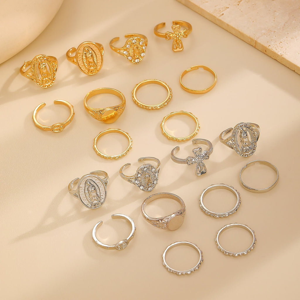 Set de Anillos de Cruz Mariana en Oro y Plata: Señal de Devoción Celestial