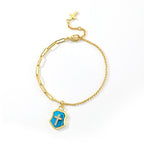 Pulsera de Bendición Escudo de Cruz de Turquesa con Circonias